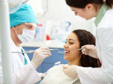 Pretty patient during dental check-up in clinic