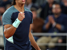 PARIS, FRANCE - MAY 24: Lorenzo Musetti of Italy celebrates winning the second set against Stefanos Tsitsipas of Greece during the Men's Singles First Round match on Day 3 of the French Open at Roland Garros on May 24, 2022 in Paris, France. (Photo by Clive Brunskill/Getty Images)